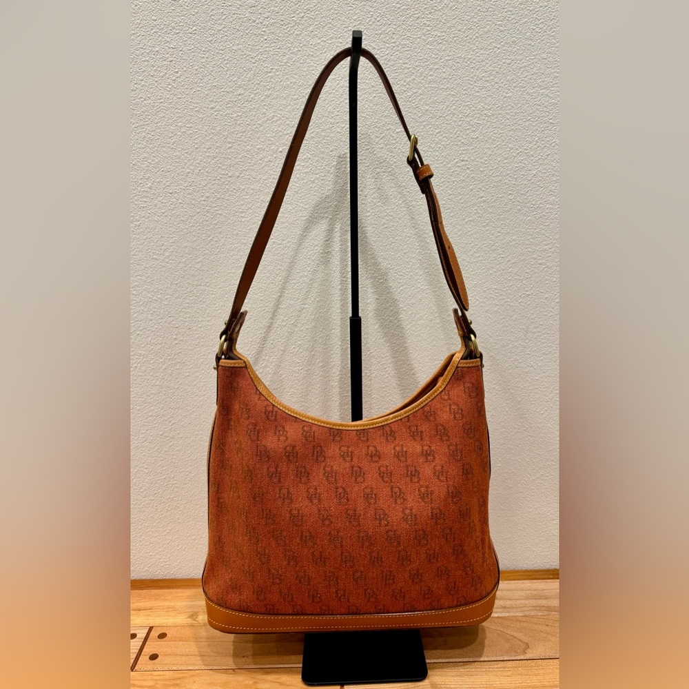 Dooney and Bourke Burnt Orange Vintage Monogram Canvas and Leather Hobo Bag
